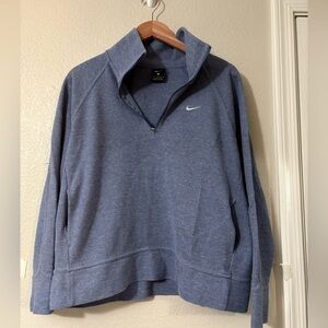 Nike 1/4 zip woman’s sweater size L. Heathered blue, with pockets. Long sleeve.